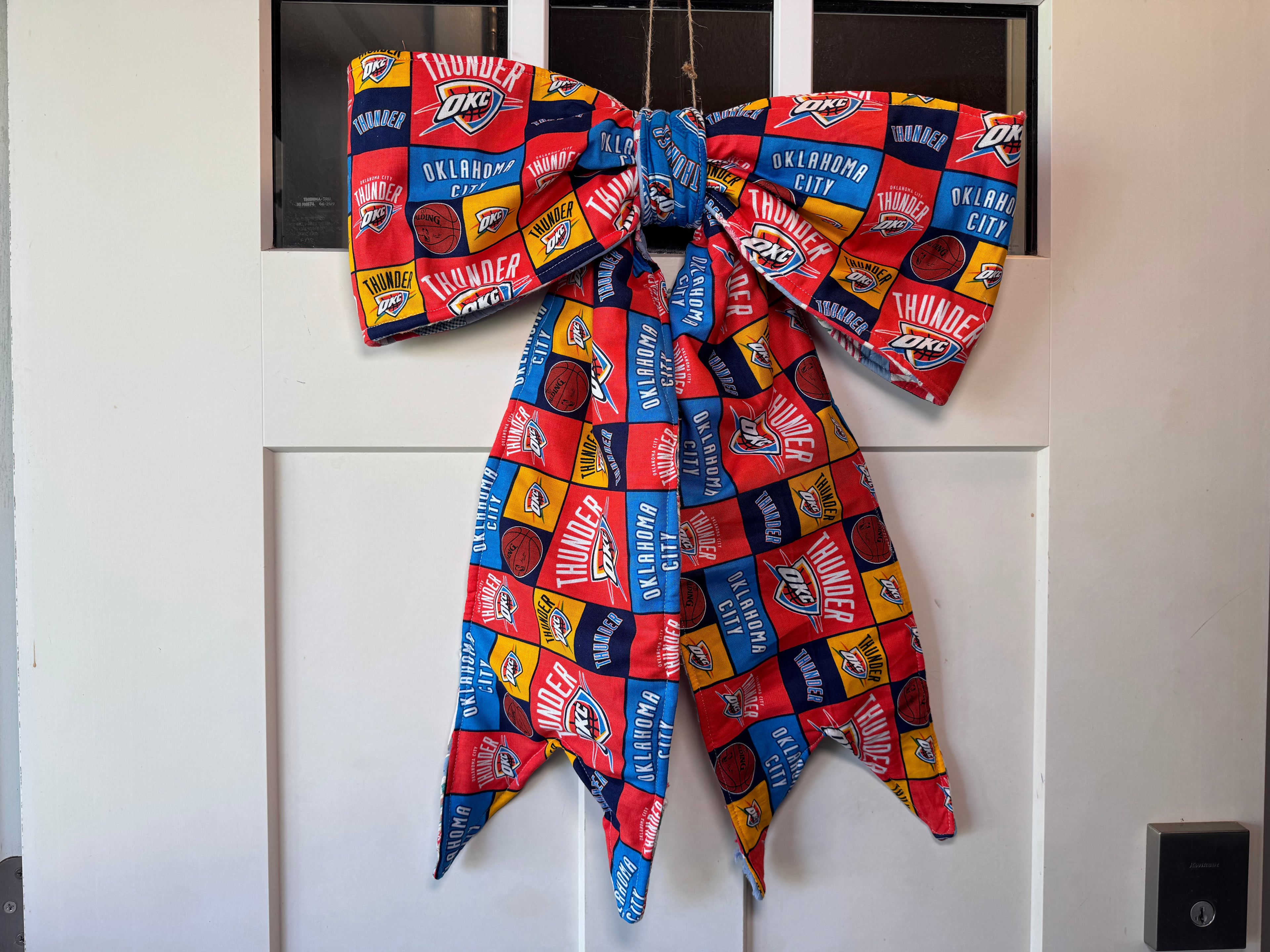 OKC/quilt reversible bow door hanger