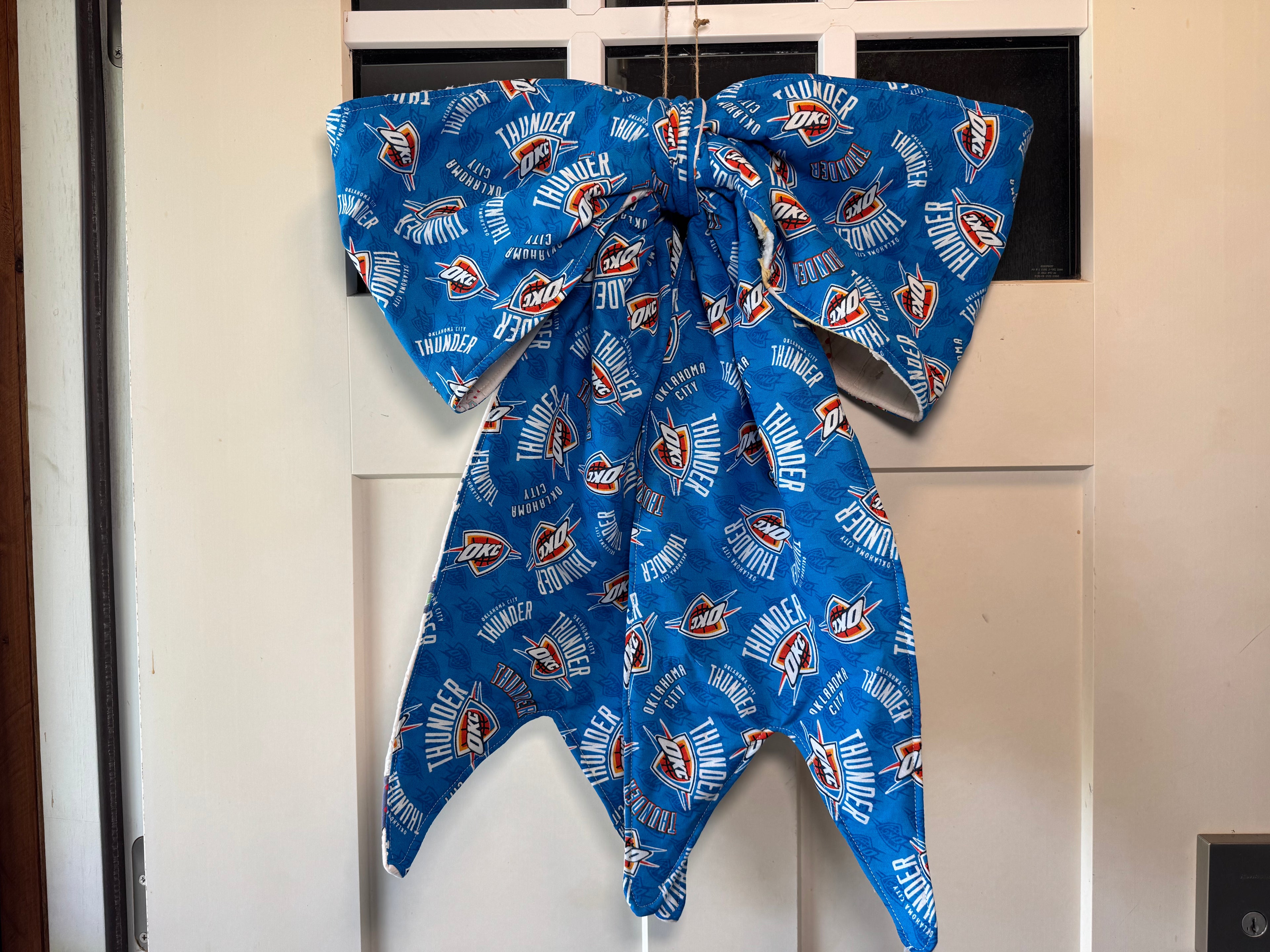 OKC/quilt reversible bow door hanger